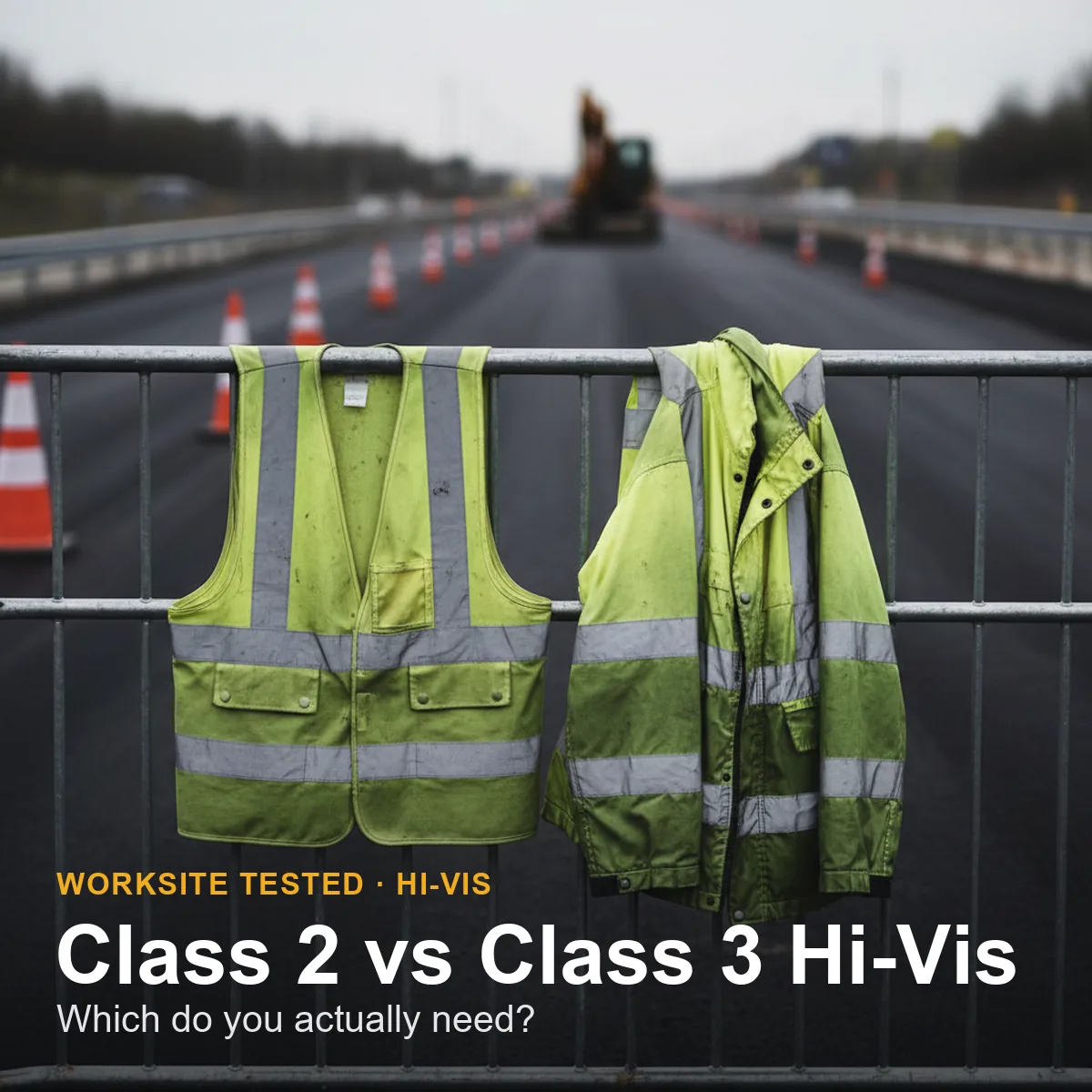 A Class 2 hi-vis vest and a Class 3 long-sleeve hi-vis shirt hung side by side on a jobsite fence